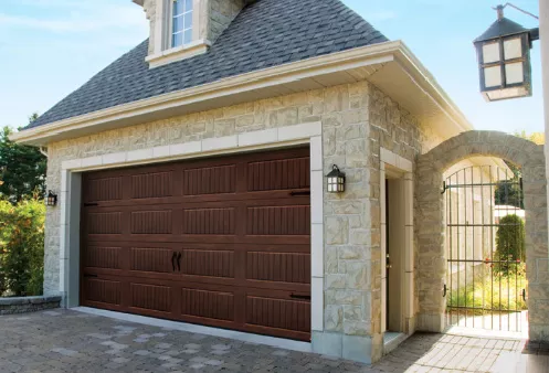 Garage door with the look of a wood door
